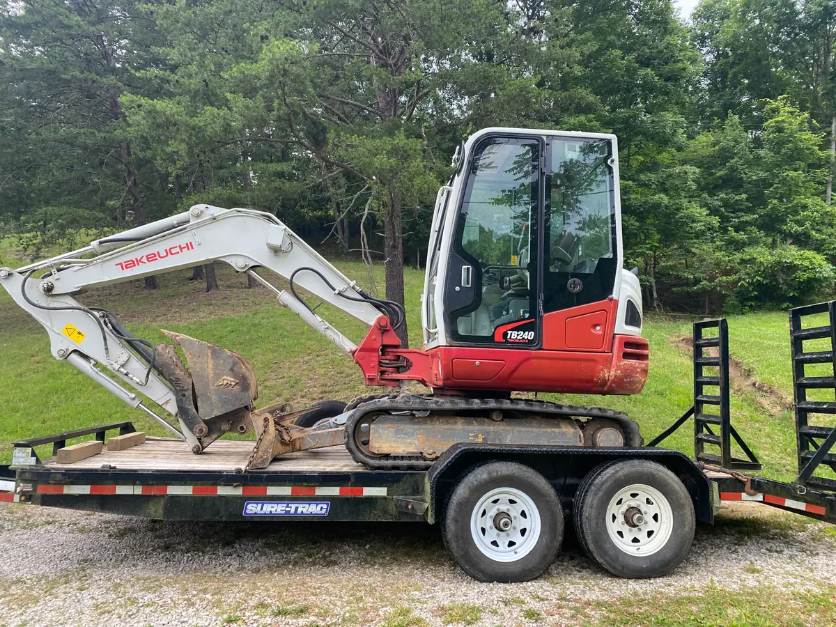 Truck and equipment trailer used for hauling