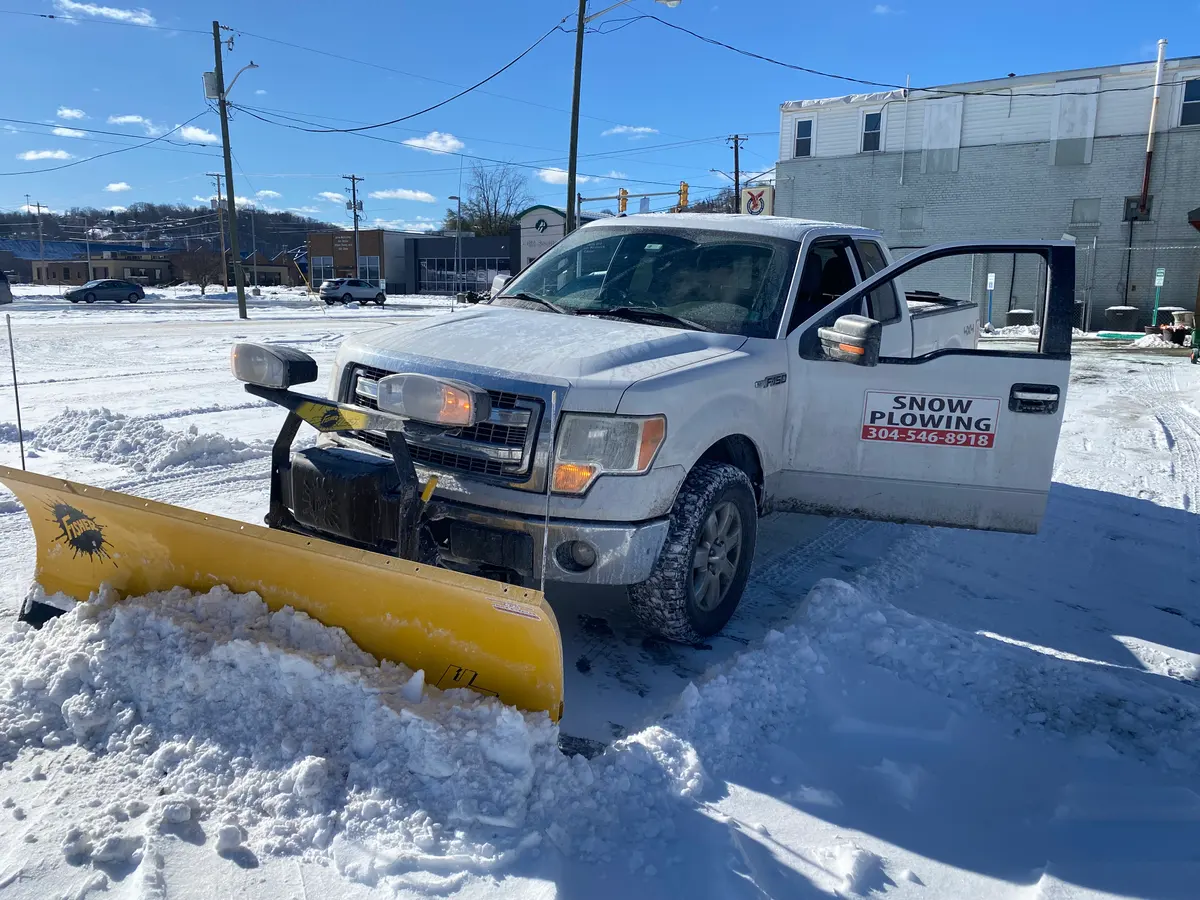 4 Seasons snow plow truck during winter work